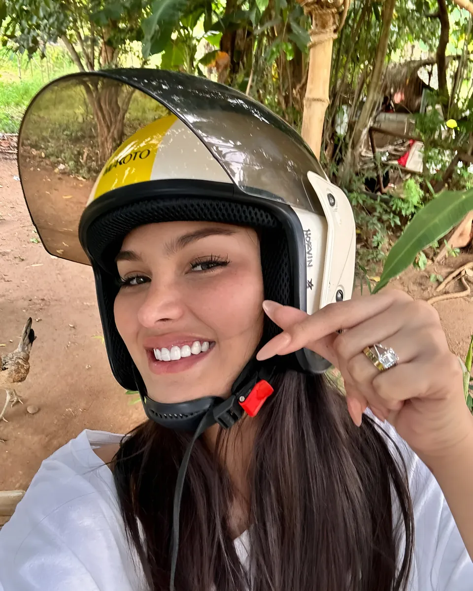 Brey Marti wearing helmet with visible ring and bird in background