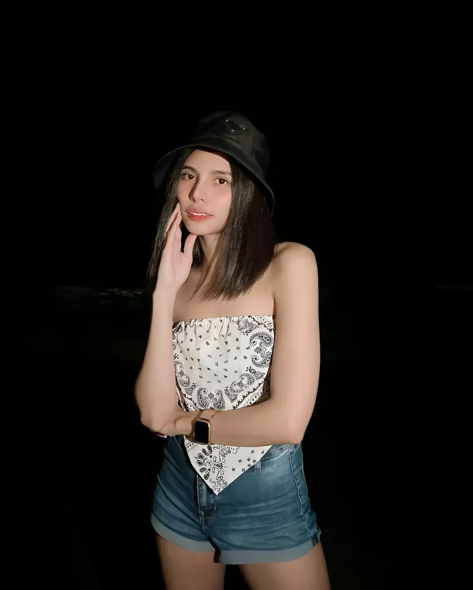 Ica Caparas wearing bandana top and denim shorts with bucket hat