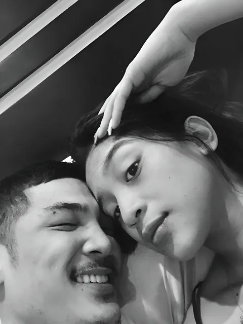 Jaymie Vale — Two people in close-up black and white portrait, one hand resting on head