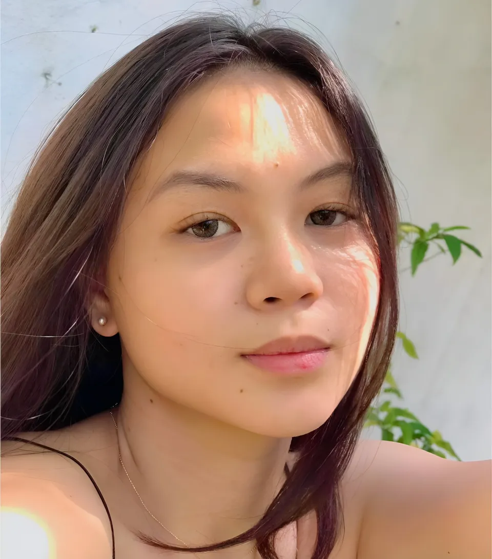 Marj Teves — A close-up portrait shows a person with sunlight falling across their face